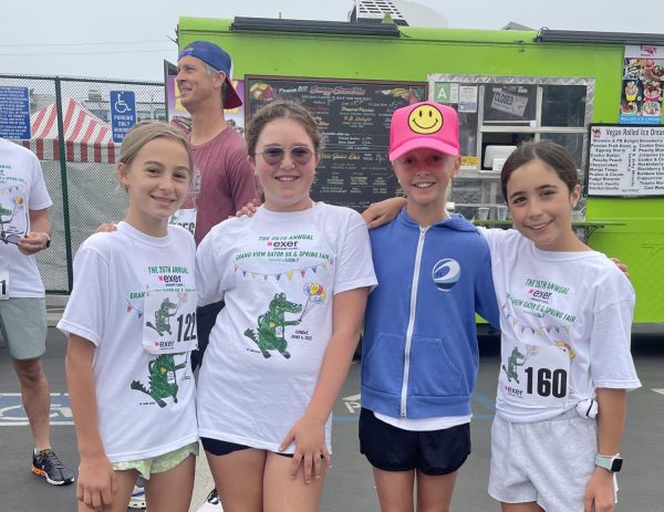 Before the race, Katarina Hess, Scout Barker, Elle Thomson, and Lydia MacDonald prepare for the annual Gator Run.